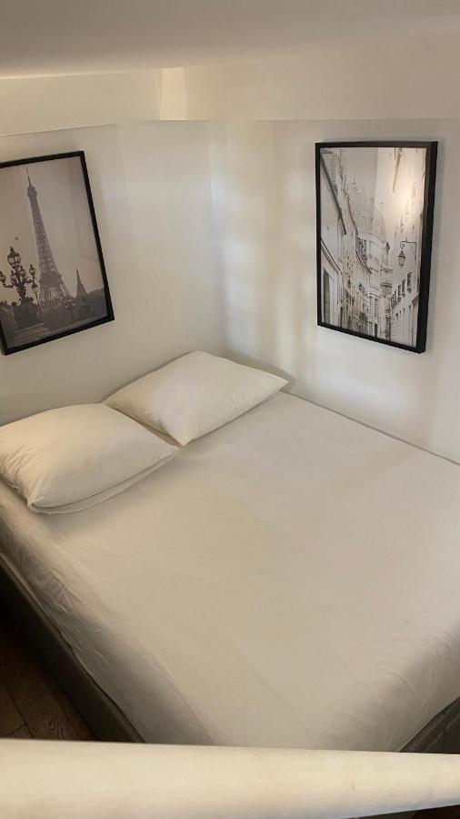 Appartamento Marais Joli Deux Pieces Parigi Esterno foto